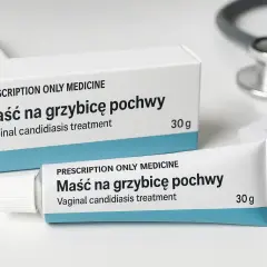 Maść na grzybicę pochwy, lek na receptę, w tubce i pudełku, obok stetoskopu i recepty.