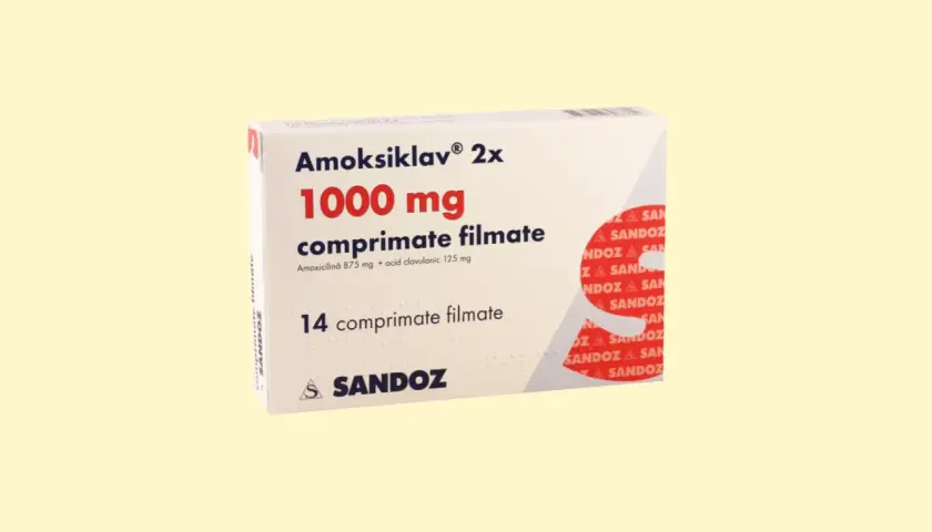 Amoksiklav 1000 mg na co? Opakowanie leku Amoksiklav 2x 1000 mg, zawierające 14 tabletek powlekanych, stosowanego w leczeniu infekcji bakteryjnych.